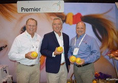 Jimmy Johnson, Tom Jerkins and Greg Drouillard with Premier Citrus out of Vero Beach, FL proudly show the company's new Natural Light labeling option.
